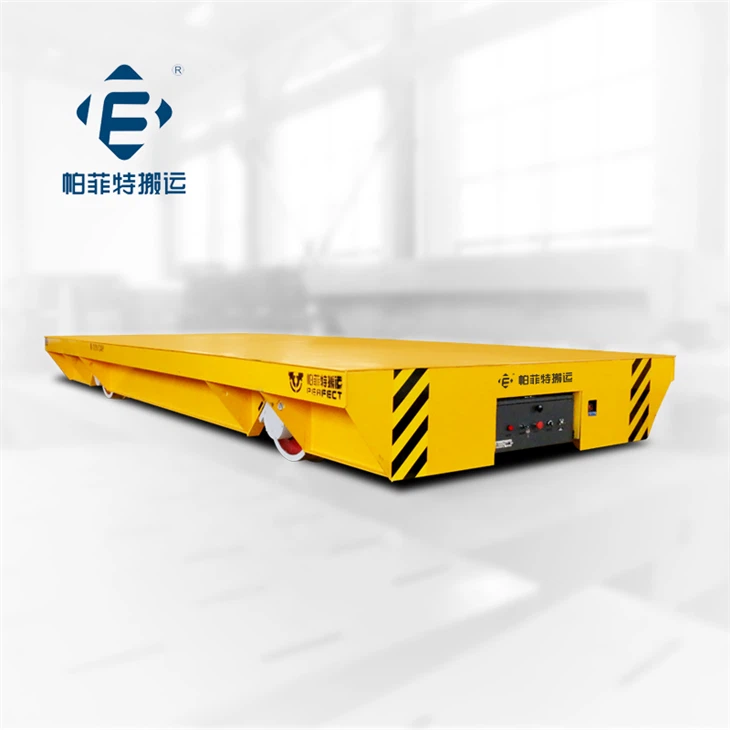 Kaablitoitega ülekandekäru rööbastel